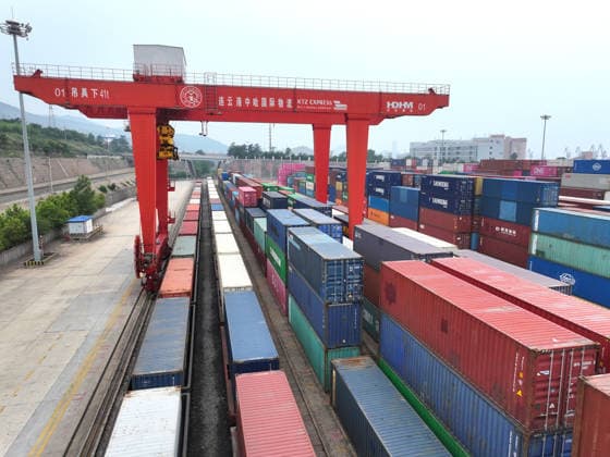 CHINA RAINWAY Express LIANYUNGANG, CHINA - JULY 3, 2026 - Large scale machinery is loading containers onto a CHINA RAILWAY Express train at the KTZ EXPRESS MULTIMODAL Company cooperative base in Lianyungang, Jiangsu Province, China on July 3, 2026. Lianyungang Jiangsu China  Copyright: xCFOTOx i1783078707097