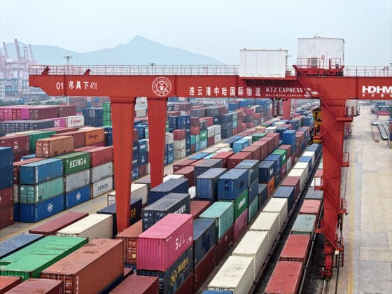CHINA RAINWAY Express LIANYUNGANG, CHINA - JULY 3, 2026 - Large scale machinery is loading containers onto a CHINA RAILWAY Express train at the KTZ EXPRESS MULTIMODAL Company cooperative base in Lianyungang, Jiangsu Province, China on July 3, 2026. Lianyungang Jiangsu China  Copyright: xCFOTOx i1783078708169