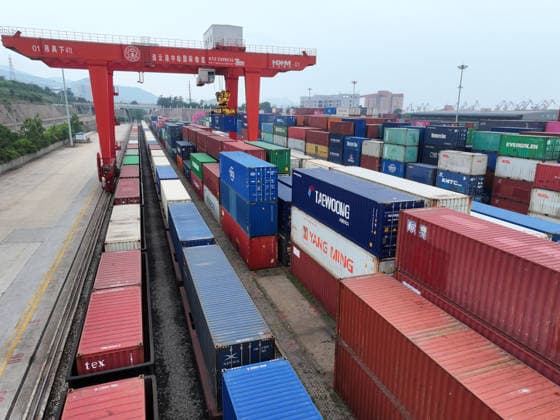 CHINA RAINWAY Express LIANYUNGANG, CHINA - JULY 3, 2026 - Large scale machinery is loading containers onto a CHINA RAILWAY Express train at the KTZ EXPRESS MULTIMODAL Company cooperative base in Lianyungang, Jiangsu Province, China on July 3, 2026. Lianyungang Jiangsu China  Copyright: xCFOTOx i1783078708891