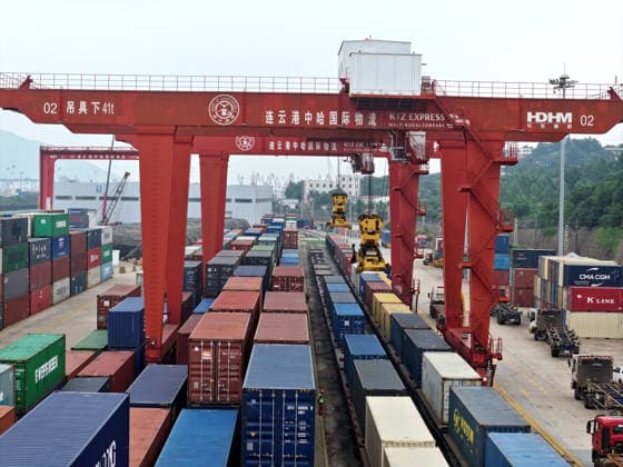 CHINA RAINWAY Express LIANYUNGANG, CHINA - JULY 3, 2026 - Large scale machinery is loading containers onto a CHINA RAILWAY Express train at the KTZ EXPRESS MULTIMODAL Company cooperative base in Lianyungang, Jiangsu Province, China on July 3, 2026. Lianyungang Jiangsu China  Copyright: xCFOTOx i1783078709355