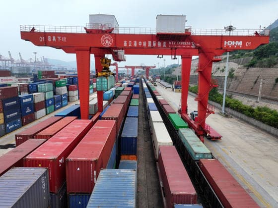 CHINA RAINWAY Express LIANYUNGANG, CHINA - JULY 3, 2026 - Large scale machinery is loading containers onto a CHINA RAILWAY Express train at the KTZ EXPRESS MULTIMODAL Company cooperative base in Lianyungang, Jiangsu Province, China on July 3, 2026. Lianyungang Jiangsu China  Copyright: xCFOTOx i1783078709950