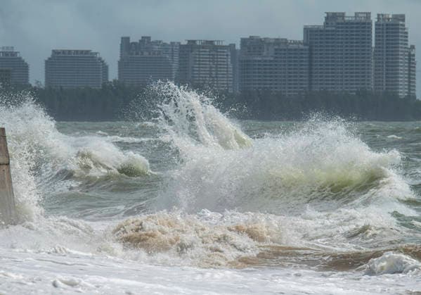 QIONGHAI, CHINA - JULY 03: Huge waves crash onto the shore at Boao beach on July 3, 2026 in Qionghai, Hainan Province of China. Typhoon Maysak is approaching the area bringing strong winds and heavy rain.  Copyright: xVCGx 111651961866