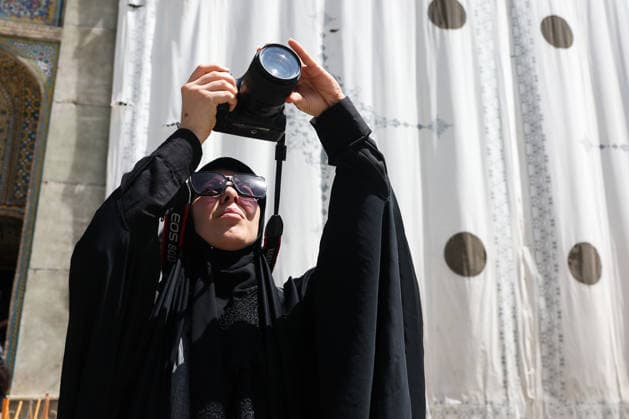 IRAN, TEHRAN - JULY 3, 2026: A woman journalist takes photographs of the Golestan Palace on the eve of the state funeral of Supreme Leader Ali Khamenei (1939-2026) set to take place from July 4 to 9. Khamenei was killed in a joint US-Israeli airstrike on his residence on February 28. Valery Sharifulin TASS  94605289
