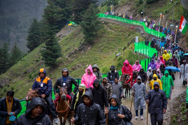 Annual Hindu Pilgrimage Amarnath Yatra begins in Baltal Sonamarg, India - 03 Jul 2026 Hindu devotees on foot make their way along a mountain path during the annual Amarnath pilgrimage to the cave shrine in Baltal some 100 km (62 miles) east of Srinagar. Thousands of Hindu pilgrims braving sub-zero temperatures begin the annual Amarnath Yatra trekking across glaciers, steep mountain trails and high altitude terrain to reach the sacred Amarnath cave shrine in the Himalayas of Indian-administered Kashmir. The cave houses a naturally formed ice stalagmite revered by devotees as a symbol of Lord Shiva, one of Hinduism s principal deities. The pilgrimage, which runs from July 3 to August 28 is expected to draw thousands of devotees making it one Copyright: xFaisalxBashirx xSOPAxImagesx 20AmarnathPilgrimage2026