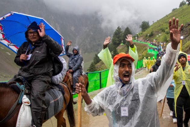 Annual Hindu Pilgrimage Amarnath Yatra begins in Baltal Sonamarg, India - 03 Jul 2026 Hindu devotees seen chanting religious slogans as they walk along a mountain path during the annual Amarnath pilgrimage to the cave shrine in Baltal some 100 km (62 miles) east of Srinagar. Thousands of Hindu pilgrims braving sub-zero temperatures begin the annual Amarnath Yatra trekking across glaciers, steep mountain trails and high altitude terrain to reach the sacred Amarnath cave shrine in the Himalayas of Indian-administered Kashmir. The cave houses a naturally formed ice stalagmite revered by devotees as a symbol of Lord Shiva, one of Hinduism s principal deities. The pilgrimage, which runs from July 3 to August 28 is expected to draw thousands of d Copyright: xFaisalxBashirx xSOPAxImagesx 23AmarnathPilgrimage2026
