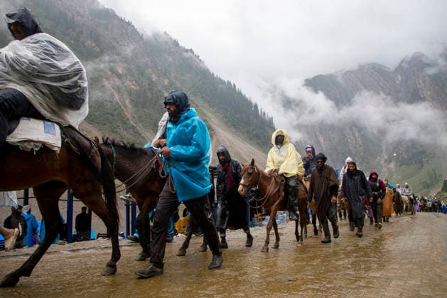 Annual Hindu Pilgrimage Amarnath Yatra begins in Baltal Sonamarg, India - 03 Jul 2026 Hindu devotees seen riding horses along a mountain path during the annual Amarnath pilgrimage to the cave shrine in Baltal some 100 km (62 miles) east of Srinagar. Thousands of Hindu pilgrims braving sub-zero temperatures begin the annual Amarnath Yatra trekking across glaciers, steep mountain trails and high altitude terrain to reach the sacred Amarnath cave shrine in the Himalayas of Indian-administered Kashmir. The cave houses a naturally formed ice stalagmite revered by devotees as a symbol of Lord Shiva, one of Hinduism s principal deities. The pilgrimage, which runs from July 3 to August 28 is expected to draw thousands of devotees making it one of H Copyright: xFaisalxBashirx xSOPAxImagesx 10AmarnathPilgrimage2026