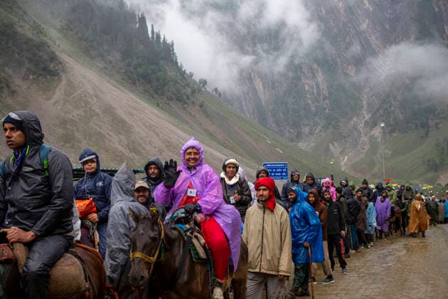 Annual Hindu Pilgrimage Amarnath Yatra begins in Baltal Sonamarg, India - 03 Jul 2026 Hindu devotees on foot make their way along a mountain path during the annual Amarnath pilgrimage to the cave shrine in Baltal some 100 km (62 miles) east of Srinagar. Thousands of Hindu pilgrims braving sub-zero temperatures begin the annual Amarnath Yatra trekking across glaciers, steep mountain trails and high altitude terrain to reach the sacred Amarnath cave shrine in the Himalayas of Indian-administered Kashmir. The cave houses a naturally formed ice stalagmite revered by devotees as a symbol of Lord Shiva, one of Hinduism s principal deities. The pilgrimage, which runs from July 3 to August 28 is expected to draw thousands of devotees making it one Copyright: xFaisalxBashirx xSOPAxImagesx 13AmarnathPilgrimage2026