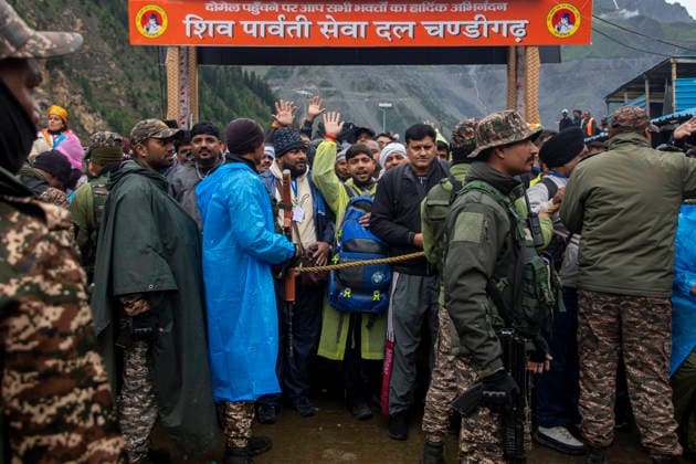 Annual Hindu Pilgrimage Amarnath Yatra begins in Baltal Sonamarg, India - 03 Jul 2026 Indian paramilitary soldiers guard as Hindu devotees chant religious slogans during the annual Amarnath pilgrimage to the cave shrine at the Baltal base camp some 100 km (62 miles) east of Srinagar. Thousands of Hindu pilgrims braving sub-zero temperatures begin the annual Amarnath Yatra trekking across glaciers, steep mountain trails and high altitude terrain to reach the sacred Amarnath cave shrine in the Himalayas of Indian-administered Kashmir. The cave houses a naturally formed ice stalagmite revered by devotees as a symbol of Lord Shiva, one of Hinduism s principal deities. The pilgrimage, which runs from July 3 to August 28 is expected to draw thous Copyright: xFaisalxBashirx xSOPAxImagesx 7AmarnathPilgrimage2026