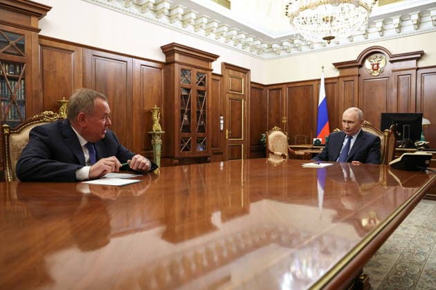 RUSSIA, MOSCOW - JULY 3, 2026: Russia s President Vladimir Putin (R) and VTB Bank Management Board President Chairman Andrey Kostin talk during a meeting in the Kremlin. Gavriil Grigorov Russian Presidential Press and Information Office TASS  94609734