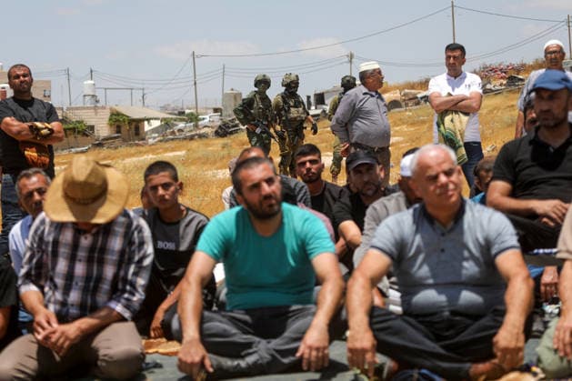 Palestinians hold Friday prayers on open land in West Bank to reaffirm their attachment to their land HEBRON, WEST BANK, PALESTINE - JULY 3: Palestinians perform Friday prayers on open land in the Hillat al-Hums area of Hebron, West Bank, on July 3, 2026. By praying on land where Israeli settlers recently erected tents nearby, Palestinians reaffirm their attachment to their land and their determination not to leave it, as Israeli soldiers maintain a presence in the area. Mamoun Wazwaz Anadolu Hebron West Bank. Editorial use only. Please get in touch for any other usage.  Copyright: x2026xAnadoluxMamounxWazwazx