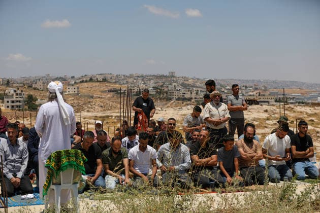 Israeli soldiers intervene against Palestinians performing Islamic Friday prayer BETHLEHEM, WEST BANK, PALESTINE - JULY 03: Israeli soldiers set up a tent and watch Palestinians performing Friday prayers during a raid on the village of Abu Nujaym, near Bethlehem in West Bank, Palestine on July 03, 2026. Tensions erupted between several Palestinian residents and Israeli soldiers, and many Palestinians were affected by the tear gas. Wisam Hashlamoun Anadolu Bethlehem West Bank. Editorial use only. Please get in touch for any other usage.  Copyright: x2026xAnadoluxWisamxHashlamounx