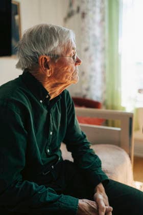 Thoughtful senior man sitting alone on bed in retirement home Sweden, Stockholm, model released, property released Copyright: xMaskotx , MA125951 MA125951