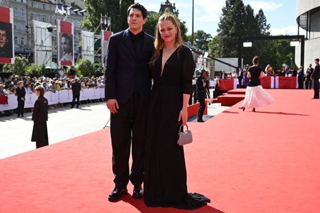 Czech actress Ester Geislerova, left, and her partner Martin Hronsky Krupa arrive at the opening of the 60th Karlovy Vary International Film Festival, on June 3, 2026, in Karlovy Vary, Czech Republic. (CTKxPhoto KaterinaxSulova) CTKPhotoP2026070306281  CTKPhotoP2026070306281
