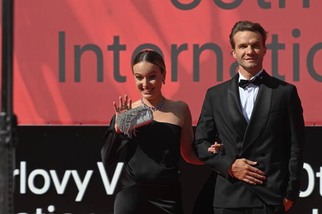 Czech actress Tereza Ramba, left, and her husband Matyas Ramba arrive at the opening of the 60th Karlovy Vary International Film Festival, on June 3, 2026, in Karlovy Vary, Czech Republic. (CTKxPhoto SlavomirxKubes) CTKPhotoP2026070306334  CTKPhotoP2026070306334