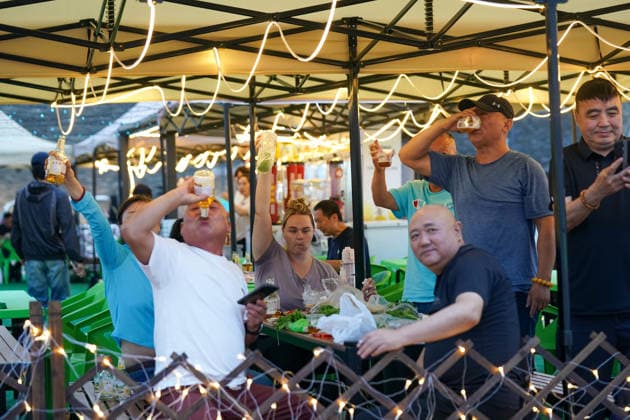 HARBIN, CHINA - JULY 03: Citizens drink beer at a beer garden during the opening of the 24th Harbin International Beer Festival on July 3, 2026 in Harbin, Heilongjiang Province of China. The festival features eight functional zones including five beer tents and 11 international beer gardens.  Copyright: xChinaxNewsxServicex 111652053304
