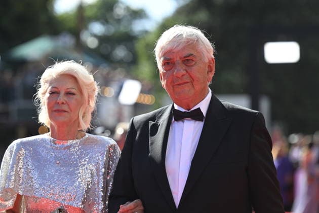 Czech actor Miroslav Donutil, right, with his wife Zuzana Donutilova arrive at the opening of the 60th Karlovy Vary International Film Festival, on June 3, 2026, in Karlovy Vary, Czech Republic. (CTKxPhoto KaterinaxSulova) CTKPhotoP2026070306581  CTKPhotoP2026070306581