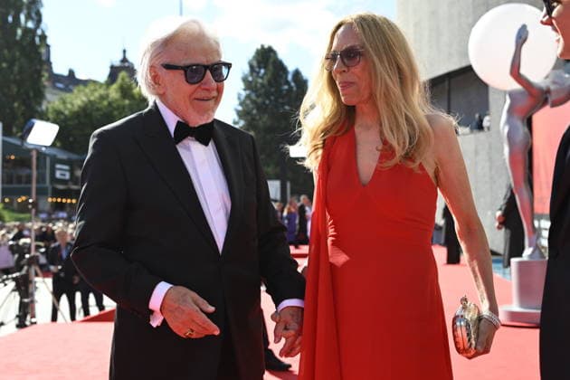 From left American actor Harvey Keitel and his wife Daphna Kastner arrive at the opening of the 60th Karlovy Vary International Film Festival, on June 3, 2026, in Karlovy Vary, Czech Republic. (CTKxPhoto KaterinaxSulova) CTKPhotoP2026070306632  CTKPhotoP2026070306632