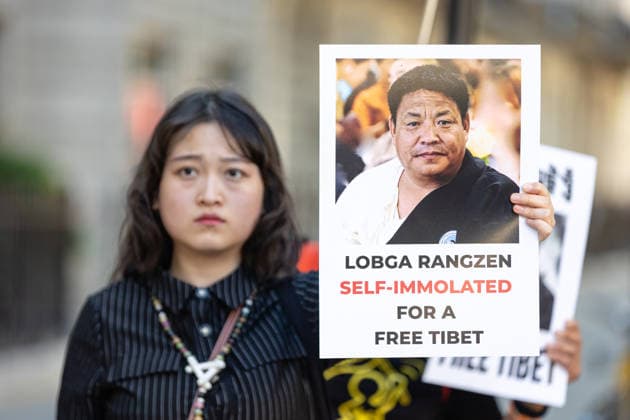 Tibetan Community Vigil for Lobga Rangzen outside Chinese Embassy, London, UK 3 July 2026 Members of the Tibetan community and supporters hold a vigil outside the Chinese Embassy on Portland Place, London, UK, on 3 July 2026. The vigil, organised by Tibet Action Institute and Free Tibet, honours the life of Lobga Rangzen, a Tibetan who died following an act of self-immolation outside the United Nations Headquarters in New York on 2 July 2026. The gathering also protests China s Ethnic Unity Law, which entered into force on 1 July 2026 and has been widely criticised by Tibetan and Uyghur organisations and human rights groups as threatening the languages, religions and cultural identities of non-Han peoples under Chinese rule., Credit:Pet  Copyright: xPetexSpellerx xAvalonx 1114209716