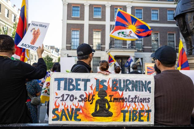 Tibetan Community Vigil for Lobga Rangzen outside Chinese Embassy, London, UK 3 July 2026 Members of the Tibetan community and supporters hold a vigil outside the Chinese Embassy on Portland Place, London, UK, on 3 July 2026. The vigil, organised by Tibet Action Institute and Free Tibet, honours the life of Lobga Rangzen, a Tibetan who died following an act of self-immolation outside the United Nations Headquarters in New York on 2 July 2026. The gathering also protests China s Ethnic Unity Law, which entered into force on 1 July 2026 and has been widely criticised by Tibetan and Uyghur organisations and human rights groups as threatening the languages, religions and cultural identities of non-Han peoples under Chinese rule., Credit:Pet  Copyright: xPetexSpellerx xAvalonx 1114209746