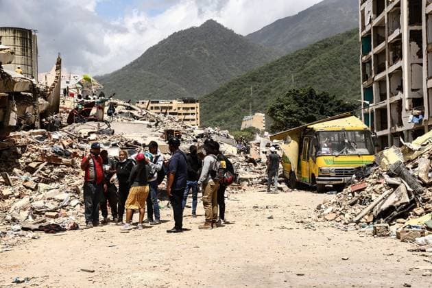 Relief and Rescue Operations Continue After Venezuela Earthquakes PLAYA GRANDE, CATIA LA MAR, LA GUAIRA, VENEZUELA JULY 3, 2026: Emergency responders, humanitarian organizations and volunteers continue relief, search and recovery operations in Playa Grande, Catia La Mar, La Guaira, Venezuela, following the devastating earthquakes that struck the country s northern Caribbean coast. Rescue teams remain deployed in affected neighborhoods while aid workers distribute emergency supplies and support displaced families as recovery efforts continue. According to the latest official figures, at least 2,295 people have been killed, more than 11,000 injured, and thousands displaced by the disaster. A GUAIRA Venezuela (Bolivarian Republic of) Copyright: x xLauraxdexChiclanax xJNAxPressx