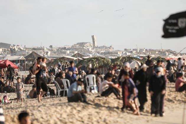 Gazan families gather along the Mediterranean amid rising summer temperatures GAZA, PALESTINE - JULY 3: Hundreds of displaced Palestinian families gather along the Mediterranean coastline in the Gaza Strip on July 3, 2026, seeking a respite from intense heatwaves and ongoing Israeli military operations. As temperatures soared across the enclave, thousands of residents fled the suffocating camps to swim and rest on the sandy beaches. Moiz Salhi Anadolu Gaza City Gaza. Editorial use only. Please get in touch for any other usage.  Copyright: x2026xAnadoluxMoizxSalhix