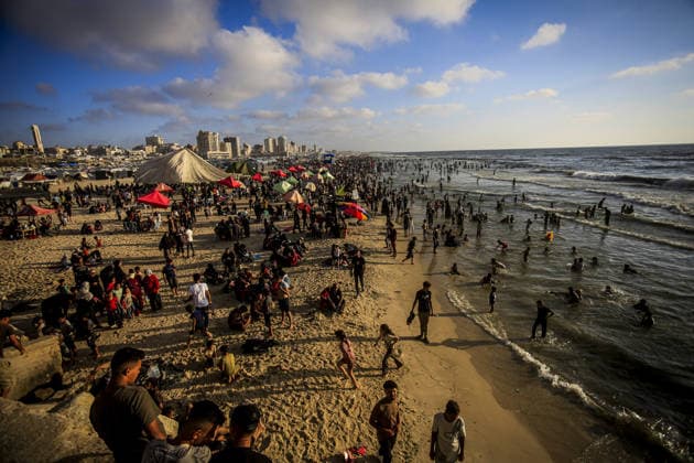 Palestinians flock to the coastline seeking relief from the heat GAZA CITY, GAZA, PALESTINE - JULY 03: As Israel s attacks on the Gaza Strip continues and soaring temperatures intensifies already harsh living conditions, Palestinians flock to the coastline seeking relief in Gaza City, Gaza, Palestine on July 03, 2026. Escaping the sweltering heat inside their tents, many sought relief by swimming off the coast of Gaza City, hoping to cool off and briefly escape the hardships of war. Saeed M. M. T. Jaras Anadolu Gaza City Gaza. Editorial use only. Please get in touch for any other usage.  Copyright: x2026xAnadoluxSaeedxM.xM.xT.xJarasx