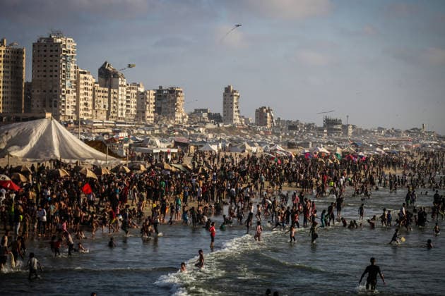 Palestinians flock to the coastline seeking relief from the heat GAZA CITY, GAZA, PALESTINE - JULY 03: As Israel s attacks on the Gaza Strip continues and soaring temperatures intensifies already harsh living conditions, Palestinians flock to the coastline seeking relief in Gaza City, Gaza, Palestine on July 03, 2026. Escaping the sweltering heat inside their tents, many sought relief by swimming off the coast of Gaza City, hoping to cool off and briefly escape the hardships of war. Saeed M. M. T. Jaras Anadolu Gaza City Gaza. Editorial use only. Please get in touch for any other usage.  Copyright: x2026xAnadoluxSaeedxM.xM.xT.xJarasx