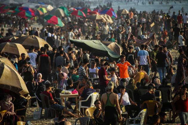Palestinians flock to the coastline seeking relief from the heat GAZA CITY, GAZA, PALESTINE - JULY 03: As Israel s attacks on the Gaza Strip continues and soaring temperatures intensifies already harsh living conditions, Palestinians flock to the coastline seeking relief in Gaza City, Gaza, Palestine on July 03, 2026. Escaping the sweltering heat inside their tents, many sought relief by swimming off the coast of Gaza City, hoping to cool off and briefly escape the hardships of war. Saeed M. M. T. Jaras Anadolu Gaza City Gaza. Editorial use only. Please get in touch for any other usage.  Copyright: x2026xAnadoluxSaeedxM.xM.xT.xJarasx