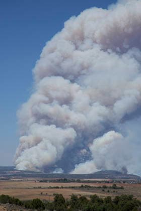 July 3, 2026, Dove Creek, Colorado, United States: July 3, 2026. The Ferris Fire which had burned more than 30,000 acres and was only 10% contained on Friday sends smoke billowing into the sky just East of Dove Creek in the Dolores River Canyon in Southwestern Colorado. The fire is a combination of the Ferris, Doe Canyon and Far Draw fires which were reported to be started by lightning strikes. Dove Creek United States  - ZUMAl92_ 20260703_zaf_l92_001 Copyright: xRalphxLauerx