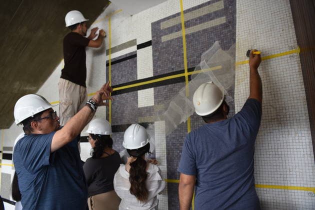 CARACAS, VENEZUELA - JULY 02: Scholars from the restoration team of the Central University of Venezuela assess damage to murals at the University City of Caracas on July 2, 2026 in Caracas, Venezuela. The University City of Caracas, located in the Venezuelan capital, is listed as a UNESCO World Heritage Site. As of July 2, the death toll from the strong earthquake in Venezuela has risen to 2,595, with over 12,000 injured and 189 buildings completely destroyed.  Copyright: xChinaxNewsxServicex 111652035088