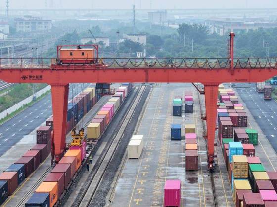 YANGZHOU, CHINA - JULY 04: A freight train loads containers at a logistics base on the Jiangdu railway dedicated line on July 4, 2026 in Yangzhou, Jiangsu Province of China. China s state railway completed a freight volume of over 2 billion tons in the first half of 2026.  Copyright: xVCGx 111652158890
