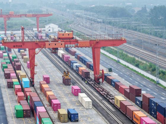YANGZHOU, CHINA - JULY 04: A freight train loads containers at a logistics base on the Jiangdu railway dedicated line on July 4, 2026 in Yangzhou, Jiangsu Province of China. China s state railway system completed over 2 billion tons of freight shipments in the first half of 2026.  Copyright: xVCGx 111652158875