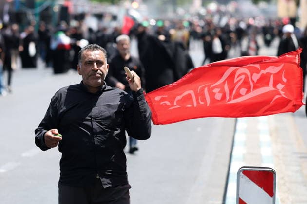 IRAN, TEHRAN - JULY 4, 2026: A man is seen outside the Grand Mosalla of Tehran (Imam Khomeini Mosalla of Tehran) ahead of the state funeral of Iranian Supreme Leader Ayatollah Ali Khamenei. Khamenei was killed in a joint US-Israeli airstrike on February 28. Valery Sharifulin TASS  94646345
