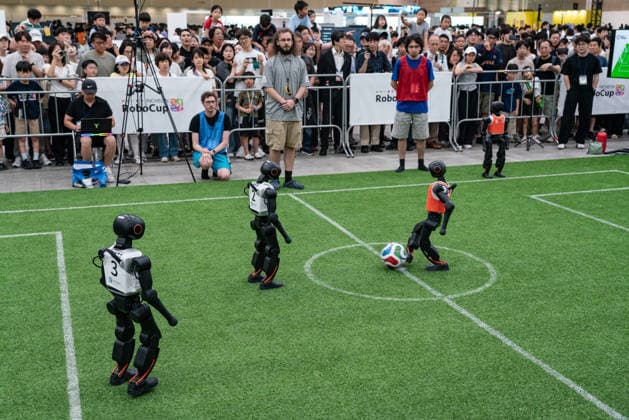 RoboCup 2026 in Incheon, South Korea - 04 Jul 2026 Humanoid robots seen playing soccer for the Humanoid soccer league at Songdo ConvensiA. RoboCup 2026 INCHEON is happening from July 2 to July 6 at Songdo ConvensiA. The event was first held in 1997 and is the world’s largest robot soccer competition and a global challenge dedicated to build a better future through artificial intelligence and robotic technologies. Incheon South Korea Copyright: xSimonxShinx xSOPAxImagesx _DSC5459