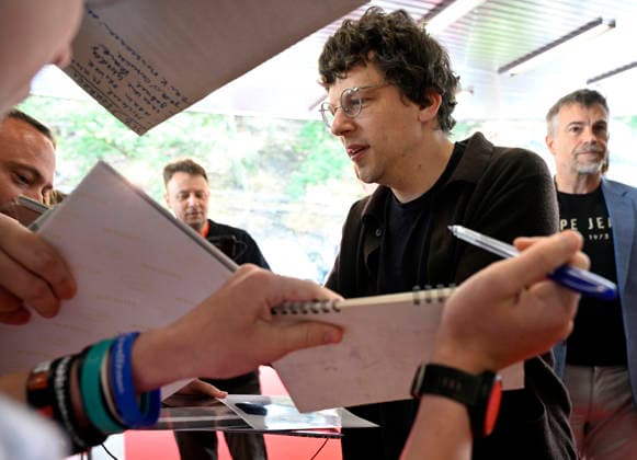 The 60th Karlovy Vary International Film Festival continued on its second day, in Karlovy Vary, Czech Republic, on July 4, 2026. American actor Jesse Eisenberg among fans. (CTKxPhoto KaterinaxSulova) CTKPhotoP2026070403238  CTKPhotoP2026070403238