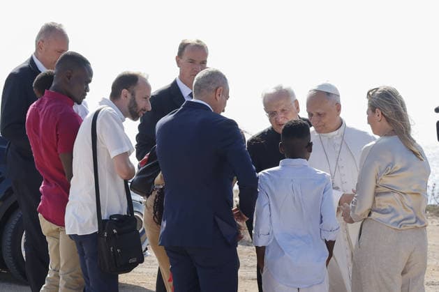 Pope Leo XIV visits the Southern Italian island of Lampedusa LAMPEDUSA, ITALY, JULY 04: Pope Leo XIV meets a family of migrants as he arrives to visit the Gateway of Europe memorial monument dedicated to migrants who died or went missing at sea, in Lampedusa, Italy, on July 04, 2026. Riccardo De Luca Anadolu Lampedusa Italy. Editorial use only. Please get in touch for any other usage.  Copyright: x2026xAnadoluxRiccardoxDexLucax