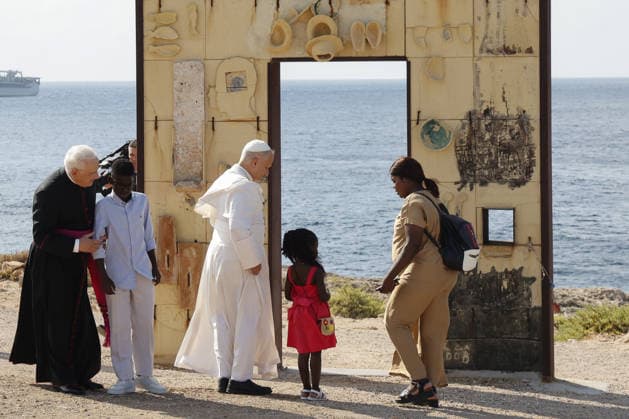 Pope Leo XIV visits the Southern Italian island of Lampedusa LAMPEDUSA, ITALY, JULY 04: Pope Leo XIV leads a family of migrants to the Gateway of Europe memorial monument dedicated to migrants who died or went missing at sea, in Lampedusa, Italy, on July 04, 2026. Riccardo De Luca Anadolu Lampedusa Italy. Editorial use only. Please get in touch for any other usage.  Copyright: x2026xAnadoluxRiccardoxDexLucax