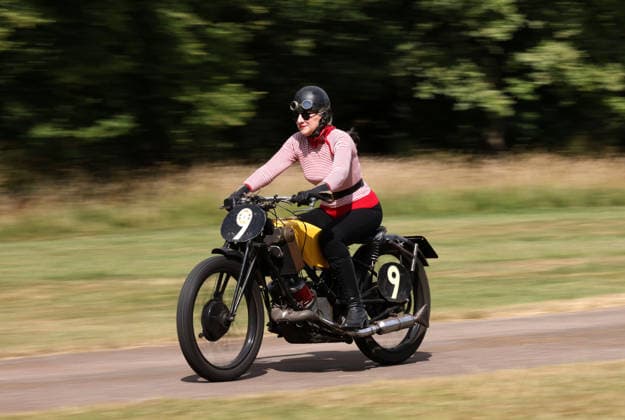 Judy Westacott on a Scott Flying Squirrel as The Vintage Speed Trials event is taking place at Grimsthorpe Castle in Lincolnshire. Featuring vintage cars and motorcycles it attracts hundreds of people to show off their vehicles, and many wear attire from the pre-war period. Vintage Speed Trials, Grimsthorpe Castle, Lincolnshire, on 4th July, 2026.  .