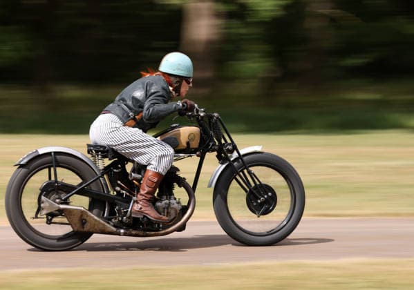 Alex Curtis on a Triumph CSD as The Vintage Speed Trials event is taking place at Grimsthorpe Castle in Lincolnshire. Featuring vintage cars and motorcycles it attracts hundreds of people to show off their vehicles, and many wear attire from the pre-war period. Vintage Speed Trials, Grimsthorpe Castle, Lincolnshire, on 4th July, 2026.  .