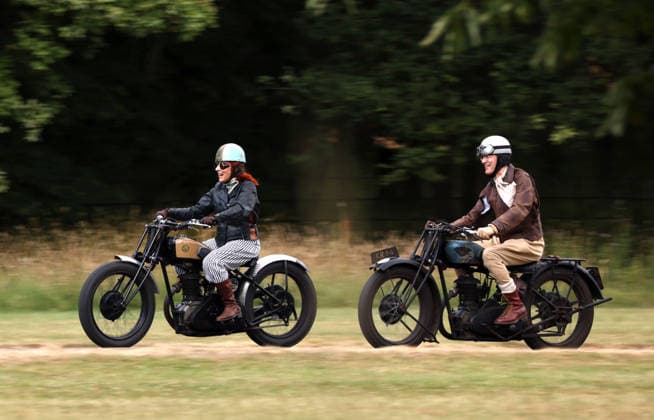 Alex Curtis on a Triumph CSD leads the way as The Vintage Speed Trials event is taking place at Grimsthorpe Castle in Lincolnshire. Featuring vintage cars and motorcycles it attracts hundreds of people to show off their vehicles, and many wear attire from the pre-war period. Vintage Speed Trials, Grimsthorpe Castle, Lincolnshire, on 4th July, 2026.  .