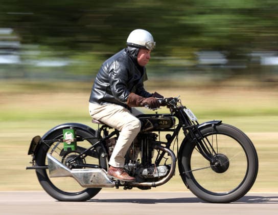 The Vintage Speed Trials event is taking place at Grimsthorpe Castle in Lincolnshire. Featuring vintage cars and motorcycles it attracts hundreds of people to show off their vehicles, and many wear attire from the pre-war period. Vintage Speed Trials, Grimsthorpe Castle, Lincolnshire, on 4th July, 2026.  .