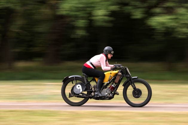 Judy Westacott on a Scott Flying Squirrel as The Vintage Speed Trials event is taking place at Grimsthorpe Castle in Lincolnshire. Featuring vintage cars and motorcycles it attracts hundreds of people to show off their vehicles, and many wear attire from the pre-war period. Vintage Speed Trials, Grimsthorpe Castle, Lincolnshire, on 4th July, 2026.  .