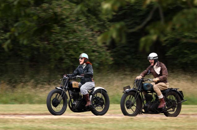 Alex Curtis on a Triumph CSD leads the way as The Vintage Speed Trials event is taking place at Grimsthorpe Castle in Lincolnshire. Featuring vintage cars and motorcycles it attracts hundreds of people to show off their vehicles, and many wear attire from the pre-war period. Vintage Speed Trials, Grimsthorpe Castle, Lincolnshire, on 4th July, 2026.  .