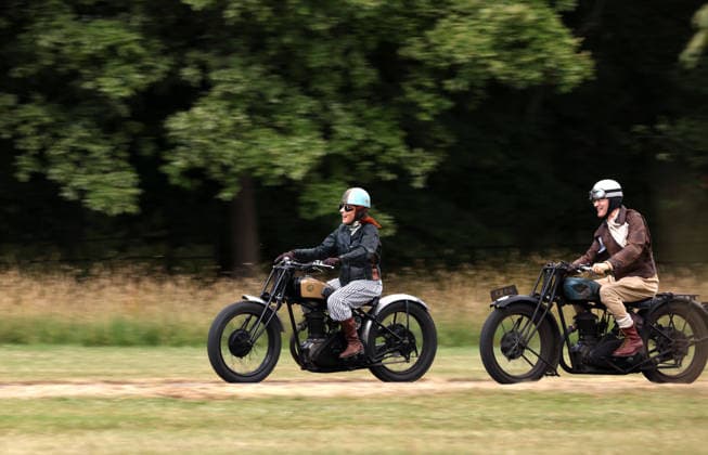 Alex Curtis on a Triumph CSD leads the way as The Vintage Speed Trials event is taking place at Grimsthorpe Castle in Lincolnshire. Featuring vintage cars and motorcycles it attracts hundreds of people to show off their vehicles, and many wear attire from the pre-war period. Vintage Speed Trials, Grimsthorpe Castle, Lincolnshire, on 4th July, 2026.  .