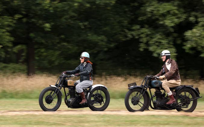 Alex Curtis on a Triumph CSD leads the way as The Vintage Speed Trials event is taking place at Grimsthorpe Castle in Lincolnshire. Featuring vintage cars and motorcycles it attracts hundreds of people to show off their vehicles, and many wear attire from the pre-war period. Vintage Speed Trials, Grimsthorpe Castle, Lincolnshire, on 4th July, 2026.  .