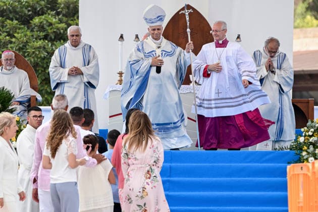 Pope Leo XIV visits the Southern Italian island of Lampedusa LAMPEDUSA, ITALY - JULY 04: Pope Leo XIV (C) seen greeting local families in Lampedusa, Italy, on July 04, 2026. Pope Leo XIV arrived in Lampedusa to rise attention to the migrant issue and the unique position of the island. During his visit he met with a group of migrants, accompanied by the Red Cross at Favaloro Pier, inaugurating a new plaque with the new name of the Pier dedicated to Pope Francis. Later nearly 4000 people gathered in the sport field to attend the homily celebrated by the Pope. Valeria Ferraro Anadolu Lampedusa Italy. Editorial use only. Please get in touch for any other usage.  Copyright: x2026xAnadoluxValeriaxFerrarox