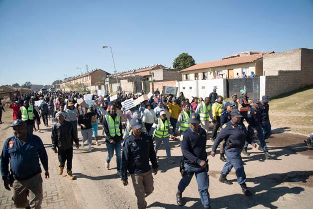 July 4, 2026, Pretoria, Gauteng, South Africa: PRETORIA, SOUTH AFRICA JULY 04: March and March protest during a march against illegal immigrants in Olievenhoutbosch on July 04, 2026 in Pretoria, South Africa. It is reported that the group is calling on the police to intervene on high crimes allegedly caused by illegal immigrants. Pretoria South Africa  - ZUMAd214 20260704_znp_d214_040 Copyright: xManashxDasx