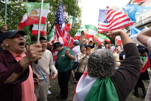 July 4, 2026, Edinburgh, Scotland, UK: Members of ScotlandÃ¢â‚¬â ¢s Iranian community opposed to the Islamic Republic demonstrated outside the U.S. Consulate in Edinburgh under the banner Ã¢â‚¬oeDonÃ¢â‚¬â ¢t Deal With TerroristsÃ¢â‚¬Â. Held to coincide with AmericaÃ¢â‚¬â ¢s Independence Day, the protestors argued that engaging with IranÃ¢â‚¬â ¢s Islamic Republic is contrary to AmericaÃ¢â‚¬â ¢s values and ideals. Edinburgh UK  - ZUMAs357 20260704_zip_s357_016 Copyright: xCameronxScottx