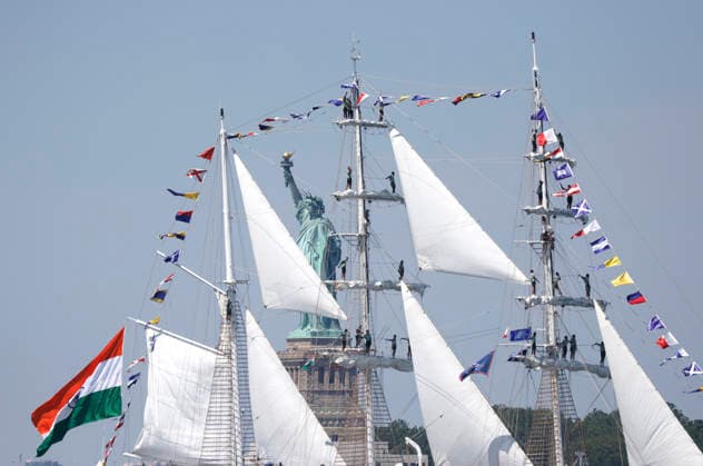 The tall ship Ins Sudarshini from India sails past the Statue of Liberty as part of Sail4th 250, a celebration for America s 250th anniversary, in New York City on Saturday, July 4, 2026. The event includes over 100 tall ships and navy vessels from more than 30 nations.  NYP20260704210 JOHNxANGELILLO