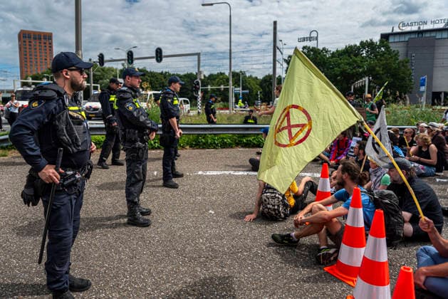 July 4, 2026, Utrecht, Utrecht, Netherlands: 4 July 2026, Utrecht, the Netherlands. Climate activists from Extinction Rebellion and Utrecht for Palestine block the A12 highway near Utrecht, Netherlands, demanding an end to billions in annual fossil fuel subsidies. Utrecht Netherlands  - ZUMAp202 20260704_zip_p202_009 Copyright: xJamesxPetermeierx